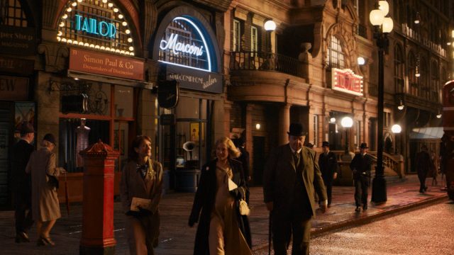 People walking around 1930s London
