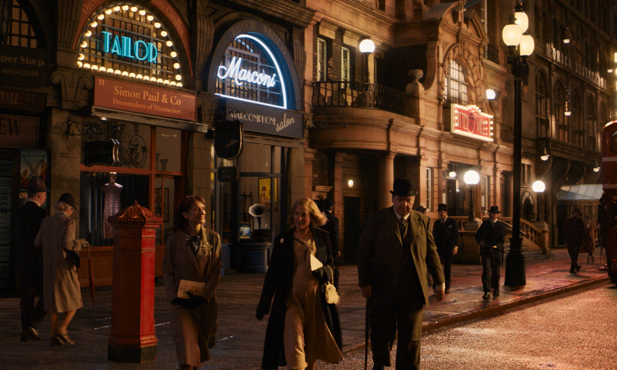 People walking around 1930s London