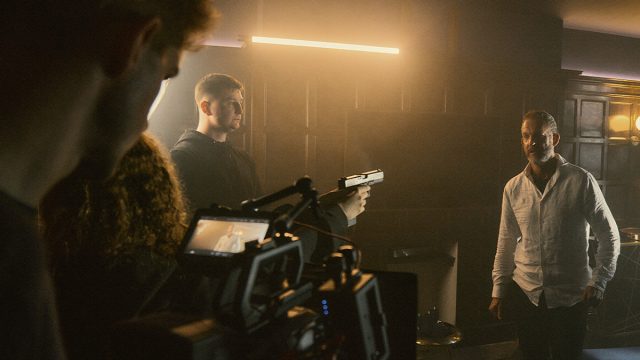 Film crew shooting on set