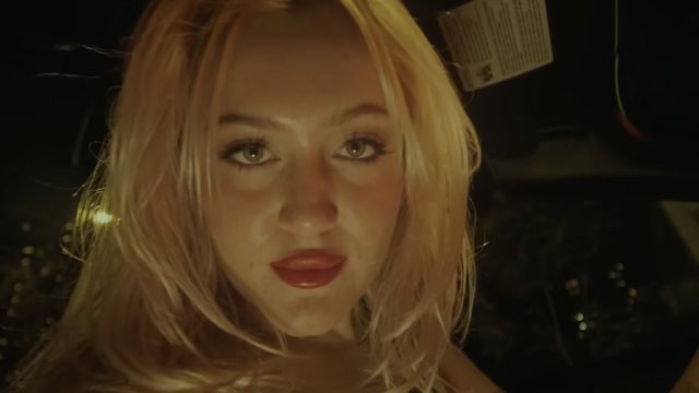 A woman staring into camera