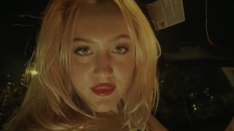 A woman staring into camera