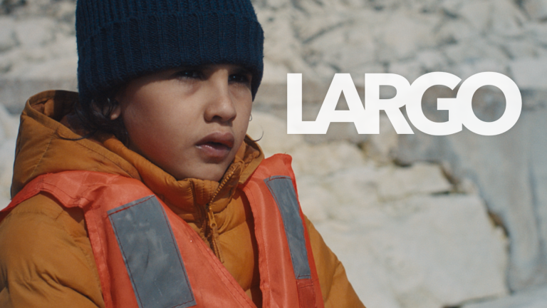 A boy in a high-vis jacket next to the word Largo