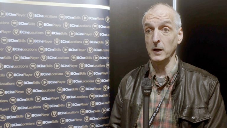 Gavin Finney holding a microphone