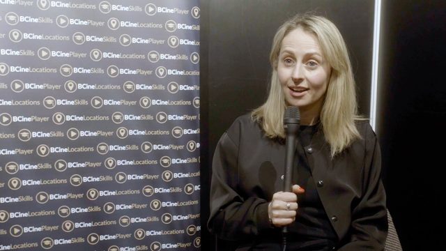 Vanessa Whyte holding a microphone