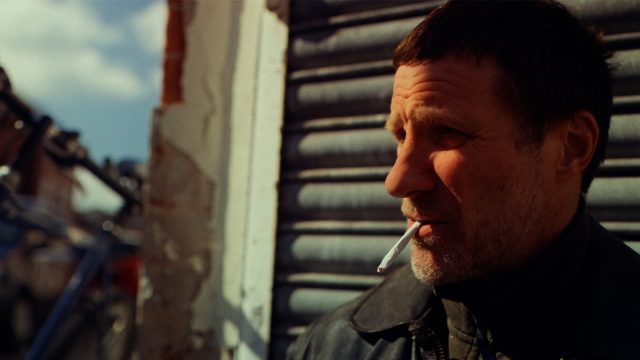 A man smoking a cigarette