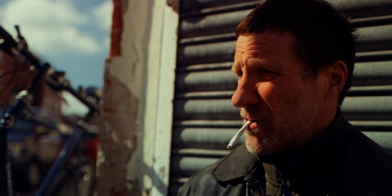 A man smoking a cigarette
