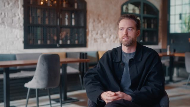 Todd Martin sat in a chair talking