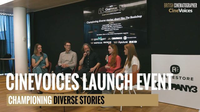 A group of people talking on a panel