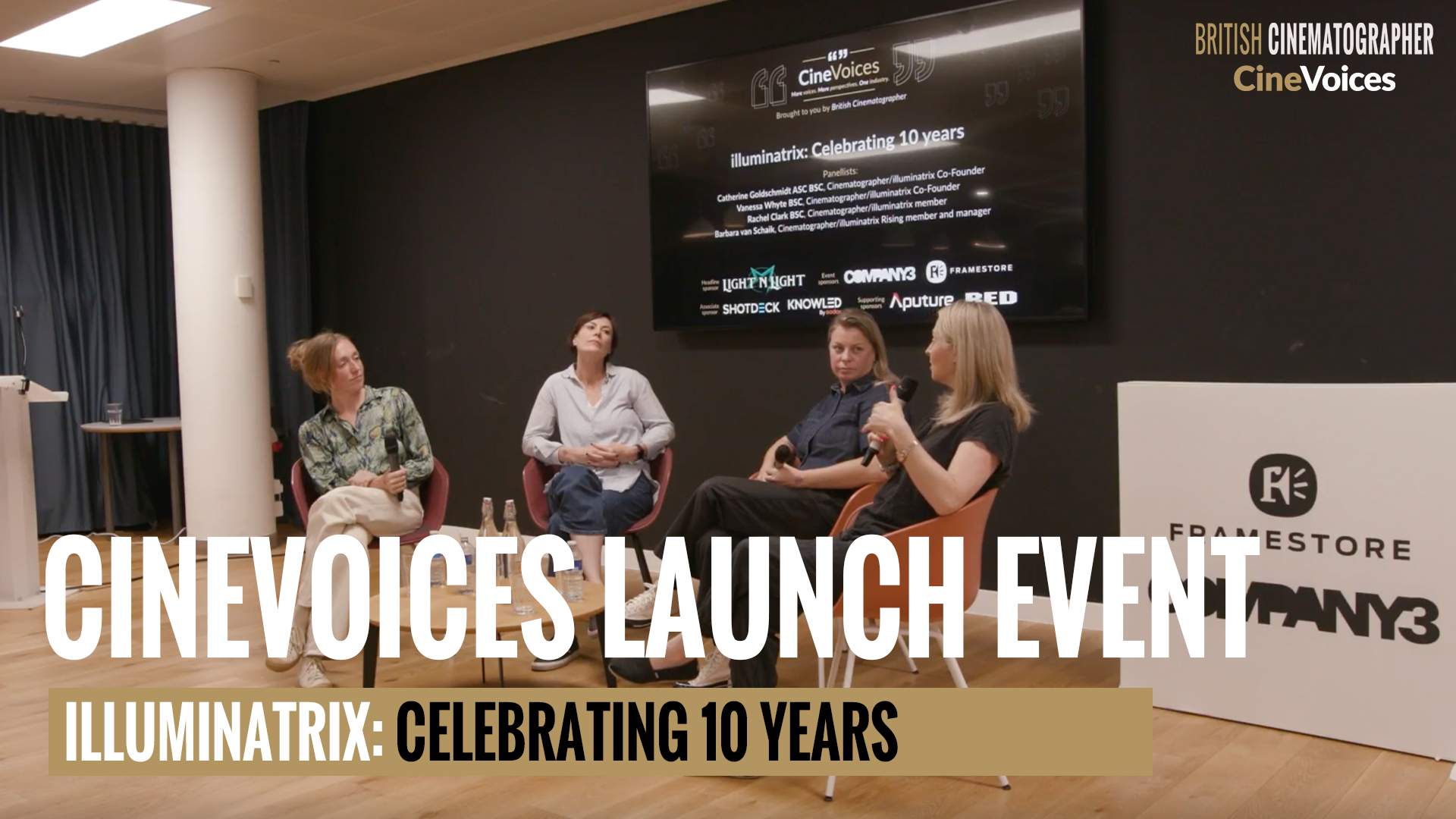 A group of people talking on a panel