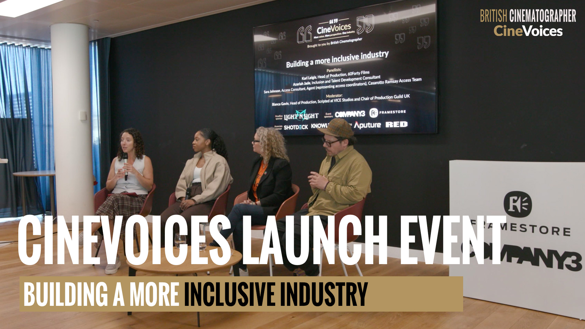 A group of people talking on a panel